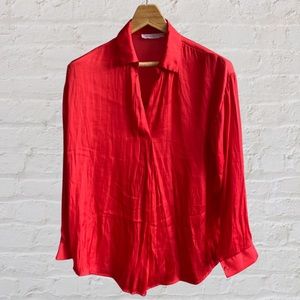 True Red, satin-like, collared blouse.